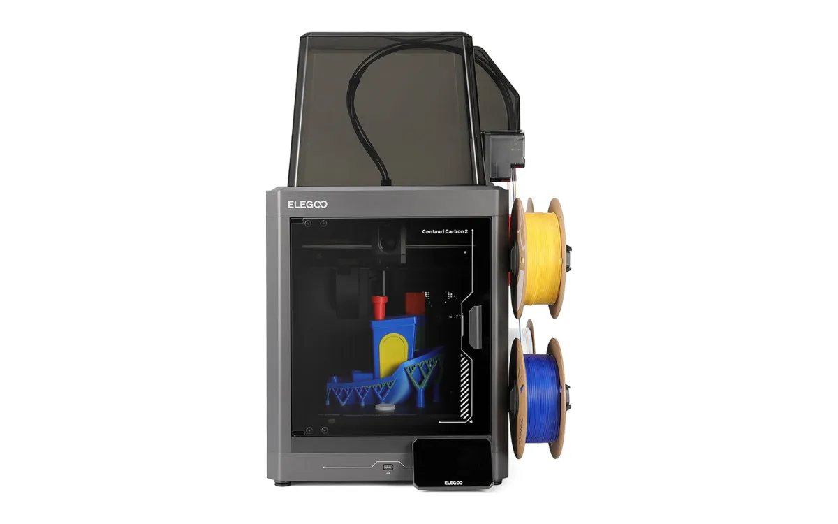 Elegoo Centauri Carbon 2 Combo printing a multicolor model, with the CANVAS unit on top and filament spools on the side