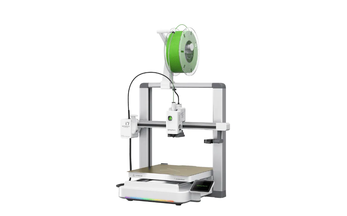 Creality SparkX i7 3D printer, front three-quarter view with a green filament spool on the top holder and the touchscreen at the front right