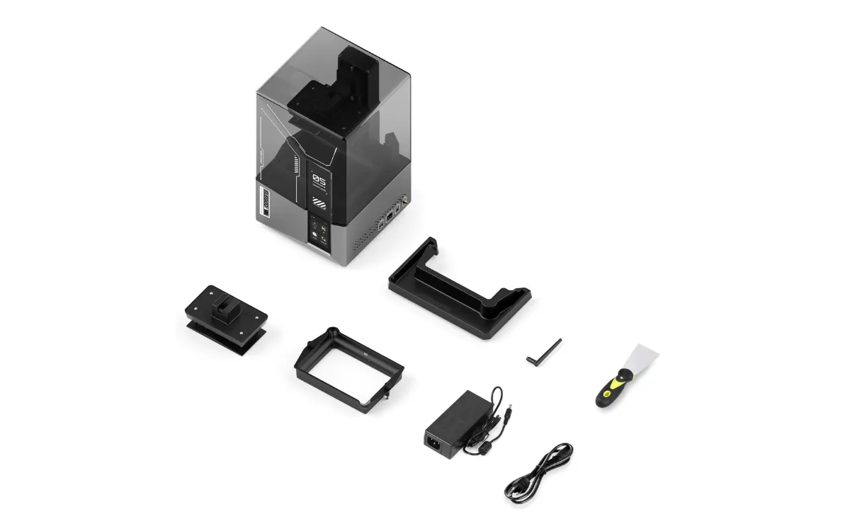 Elegoo Mars 5 Ultra with its build plate, resin vat, power adapter, cable and tools laid out